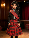 Girls Scottish folk costume set, stand collar black long sleeve top with white piping, red plaid sash and pleated midi skirt. Classic tartan design for folk dance performance and school cultural day dress-up.