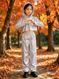 Girls holographic silver 2-piece stage costume, cropped hooded long sleeve top and elastic waist straight pants. Shiny reflective finish, trendy street style for dance competitions and performance dress-up.