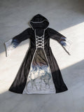 Girls gothic hooded long dress with skull print details. Classic black & white medieval styling. Perfect for Halloween parties, haunted theme events, carnival dress-up and spooky role-play activities.