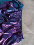 Girls 2-piece metallic stage outfit, cropped hooded long sleeve top matched with elastic waist wide leg pants. Shiny iridescent fabric, cool street style for hip-hop shows and runway costume events.