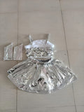 Girls 3-piece silver stage outfit, fuzzy trim sequin cami crop top, double-layer ruffle skort and matching arm sleeves. Shiny metallic silver design, youthful futuristic style for dance competition and school gala costume.
