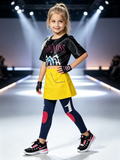 Girls cool street style costume set includes printed cropped top, yellow skirt overlay and padded leggings. Trendy racing inspired look, great for stage shows, themed parties and kids dress-up activities.