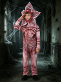 Boys monster creature costume set includes full body textured jumpsuit and flower-shaped monster headpiece. Creepy flesh-toned striped print, perfect for Halloween, haunted house events and scary themed role-play.