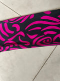 Girls full-zip long sleeve jumpsuit with swirling pink tribal print. Slim stretch fit one-piece costume, sleek full-length design, great for dance performance, cosplay and loungewear dress-up.