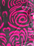 Girls full-zip long sleeve jumpsuit with swirling pink tribal print. Slim stretch fit one-piece costume, sleek full-length design, great for dance performance, cosplay and loungewear dress-up.