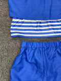 Girls' Nautical 4pcs Set Includes a Blue Striped Top, Vest, Blue Shorts, And a White Printed Hat. Features Classic Blue And White Sailor Stripes with a Red Bow Accent. The Vest And Headband Design Enhance The Uniform'S Professional Look