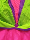 Girls whimsy mad hatter costume set includes long sleeve jacket, pink tutu skirt and mini top hat headband. Vibrant colorful design, ideal for Halloween, tea party theme and fantasy role-play activities.