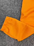 Kids orange inmate costume set includes knotted short-sleeve shirt and elastic cuff long pants. Printed letter details, great for Halloween parties, themed role-play and carnival dress-up.