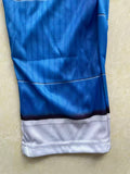 Kids adventure-themed jumpsuit costume with distinct chest badge detail, long sleeves and cargo-style pants. Ideal for theme parties, Halloween, cosplay and imaginative role-play activities for young kids.