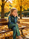 Kids reptile scale print jumpsuit, mock neck long sleeve full-length one-piece costume. Green gradient snake skin pattern, stretch slim fit, suitable for dinosaur reptile themed cosplay and Halloween dress-up.