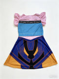 Girls fantasy adventure cosplay dress with ruffle cap sleeves. Faux zipper & buckle print bodice, color block geometric skirt, bright multi-color design for magic forest themed party and dress-up events.